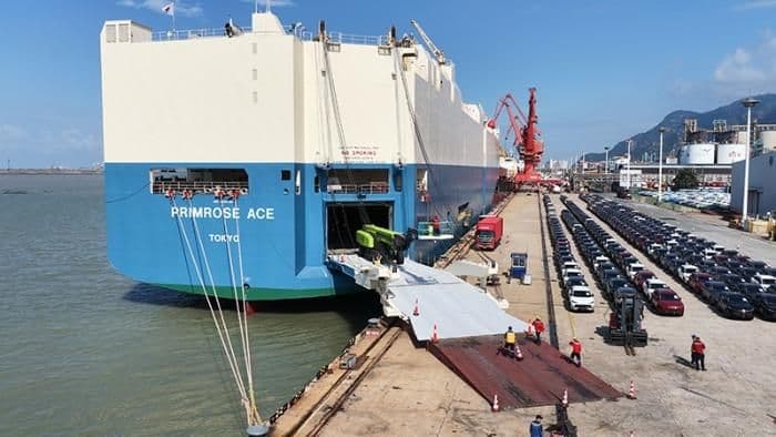 Ro-Ro car carrier vessel loading vehicles at the quay
